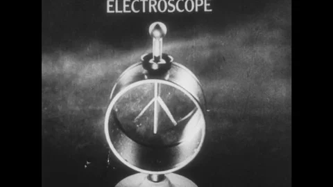 1970s: Electroscope moves as different rods touch its surface. Stock Footage 75142134