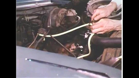 1970s - Engine modifications reduce exhaust emissions, in 1970. Video stock 132200807