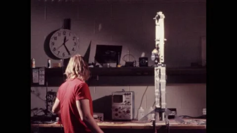 1970s: Engineer running tests on rover part. Stock Footage 174732707