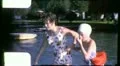 1970s Girls Jump Off Pier Into Lake Swim Go Swimming Vintage Film Home Movie HD Footage