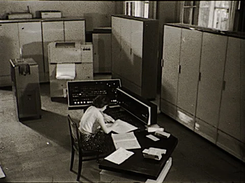1970s IBM Computer Control Room Female Programer Console Vintage Film Movie Stock Footage 153880955