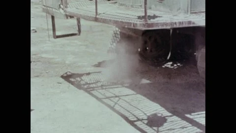1970s: man uses levers with knobs to operate spinning drill, looks at gauges, 스톡 동영상 196949888