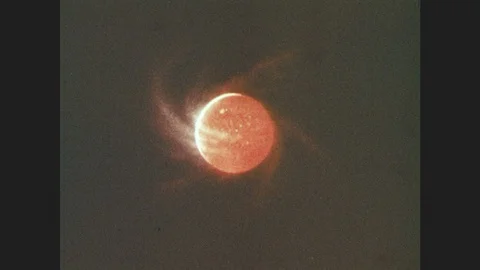 1970s: Mars eclipses the Sun. Illustration of Mars releasing heat. Stock Footage 86688503