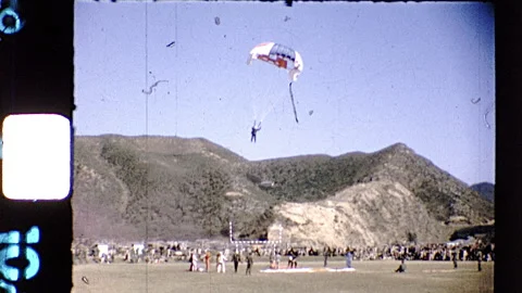 1970s Parachute Ejection Seat Jumping Man Skydiver Vintage Film Home Movie 8mm Stock Footage 197091774