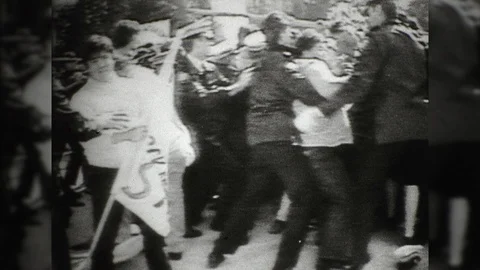1970s People Fight Police Violent Riot Demonstration Protest Vintage Film Movie Stock Footage