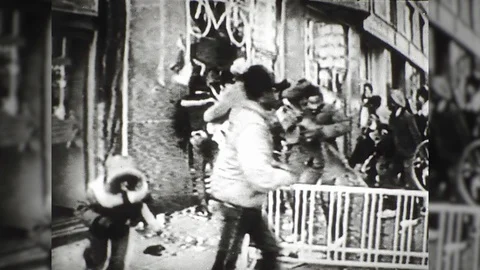 1970s People Loot Store Police Car Looting  Steal Street Riot Vintage Film Movie Stock Footage