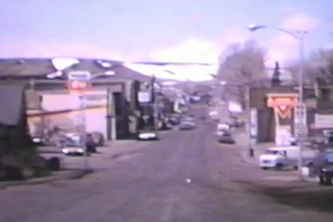 1970s point-of-view through car window streets of Evanston, Wyoming. Stock Footage 100303508