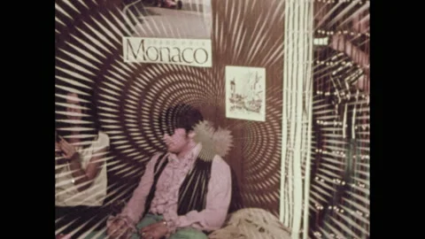 1970s: Psychedelic pattern, pan to people smoking joints. People smoking on Stock Footage 148501386