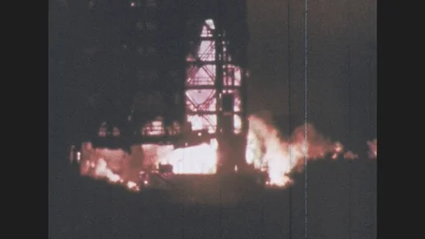 1970s: Rocket takes off. Rocket breaks from launch base. Rocket takes off, smoke Stock Footage 80059848