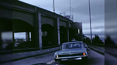 1970s SAN FRANCISCO Oakland Bay Bridge Driving Across Vintage Film Home Movie Stock Footage