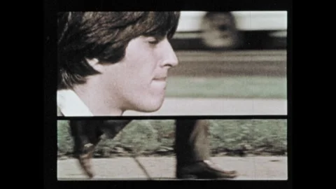 1970s: Split screen: walking legs, man’s face. Traffic lights, man crosses Stock Footage 252041243