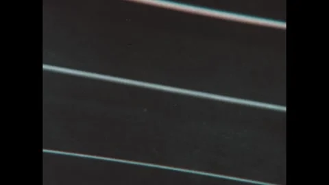 1970s: Strings on violin vibrate when played. Illustration of string vibrating 스톡 동영상 295297014