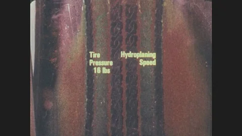 1970s: Tire tread and print. Text graphics list over tire print. Stock Footage