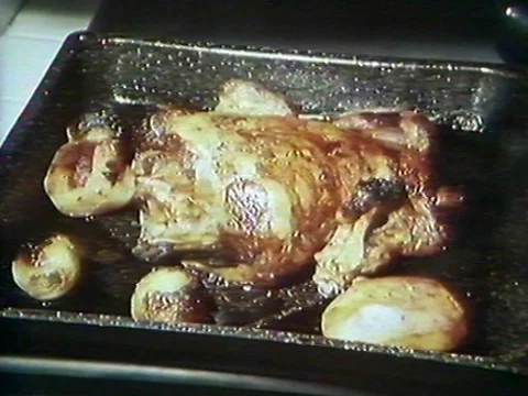 1970s: Traditional Roast Meal Taken From Oven Stock Footage 80663465