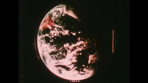 1970s: UNITED STATES: view of Moon and Earth. Clouds over the planet. Space Stock Footage