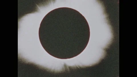 1970s: View of solar eclipse. View of universe. Man speaks. Aerial view of Stock Footage 156666606