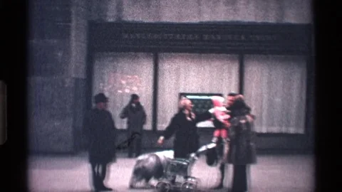 1971: Man Carries Two Children Behind Two Women, Sheepdog and Stroller Vidéo 73569652
