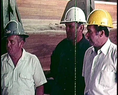 1971: Sawmill Workers / Man Chops Large Log Stock Footage 48437900