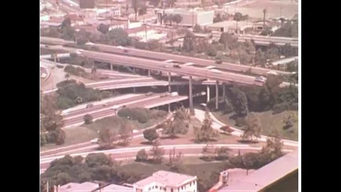 1971 'shots of a vast array of people affected by and benefitting from the Stock Footage 115545639