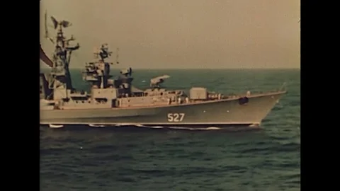 1971 - In this Soviet propaganda film, Soviet gun crews are called on deck for a Stock Footage 141645341