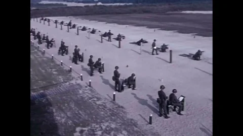 1971 - A trainee leader helps cadets who are struggling with aspects of basic Stock Footage 87149878