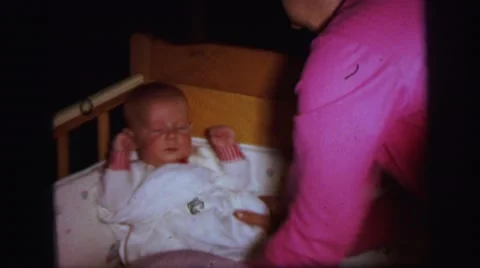 1972: baby in crib LYNBROOK, NEW YORK Stock Footage