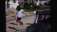 1972: Girls Playing Jumping Rope On The Roads Lynbrook, New York Stock Footage