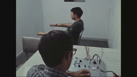 1972 - A man operates a polygraph machine at a US Army crime lab. Stock Footage 120206848