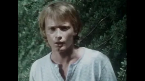1972 - A witch who gets her power from the water tries to tell the mortal man Stock Footage 129450175
