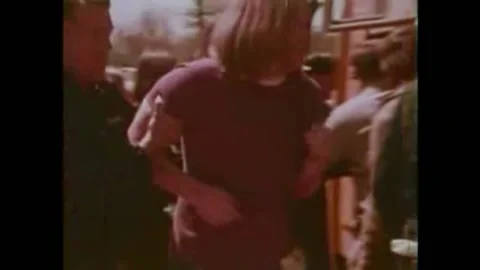 1972 - Wounded children are pulled from a school bus after it's been totaled in Stock Footage 157815171