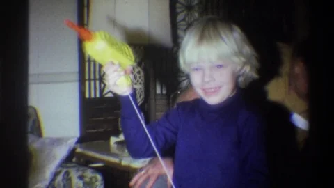 1973: Blonde Boy Plays With Pull String Toy New York Stock Footage 70180337