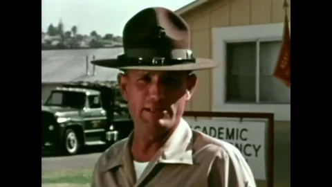1973 - A Drill Instructor addresses recruits as they stand at attention at Stock Footage