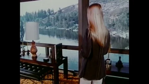 1973 - In this horror film, a young woman screams as an unknown being Stock Footage