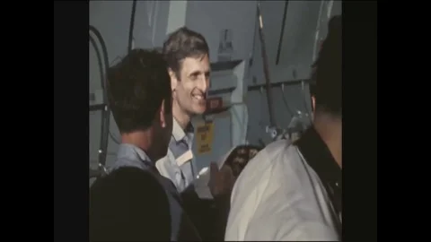 1973 - Returned American POWs aboard an aircraft at Hanoi Airport, Lt. Comdr. Stock Footage 83419614