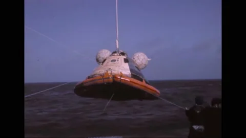 1973 - The Skylab 2 command module is brought up to the USS Ticonderoga after Stockbeeldmateriaal 232851641