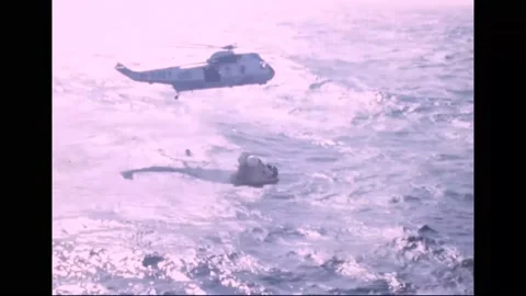 1973 - US Navy helicopters drop ropes to the Skylab 2 command module, so it can Stockbeeldmateriaal 232851863