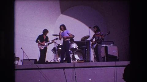 1973:MEDFORD NEW JERSEY USA. Singer In A Crop Top Guitarist Bass Player Drummer Stock Photos