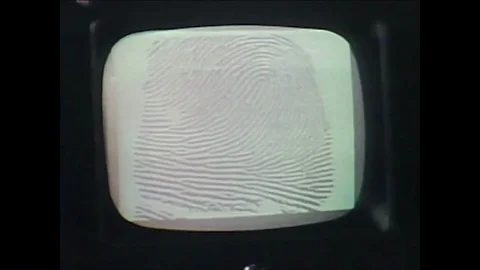 1974 - An automatic fingerprint reader system is shown as well as a pistol being Video stock 87149607