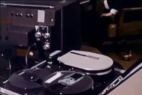 1974 - Cops give a drunk driver a breathalyzer test, which reveals he was Stock Footage 99671221