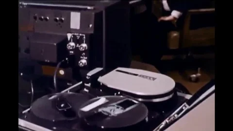 1974 - Cops give a drunk driver a breathalyzer test, which reveals he was Stock Footage 120041491
