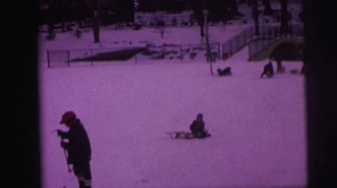 1974: kids playing in the snow LYNBROOK, NEW YORK Stock Footage