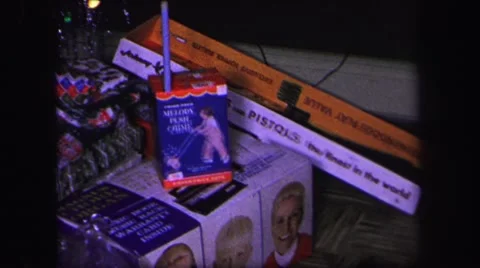 1974: a look at the many presents and toys from a past family christmas Stock Footage