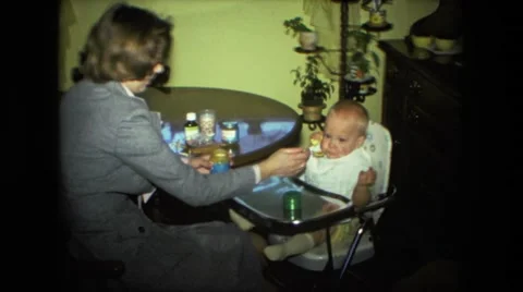 1974: mother with small child is seen FORT WAYNE, INDIANA Stock Footage