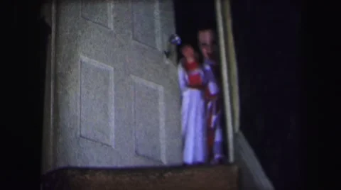 1974: two little ones who just can't stop waving goodbye for the camera Stock Footage