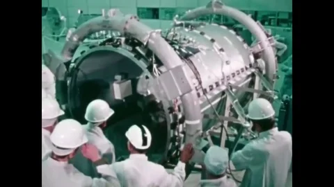 1975 - Technicians work on the docking module for the Apollo-Soyuz Test Project. Stock Footage 84045835