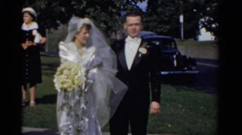 1975:BRIDGEPORT WEDDING.A Bride Stands For A Photo Or Video Recording While Her Stock Photos