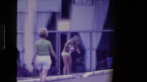1976: women are seen in beautiful dresses FORT WAYNE, INDIANA Stock Footage