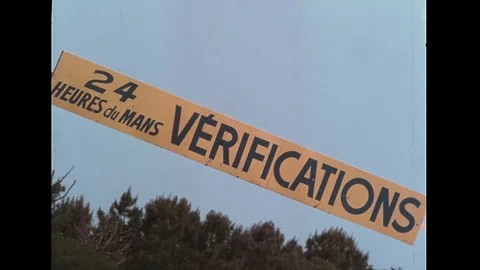 1977 24 Hours of Le Mans - Verifications sign and Goodyear blimp pre-race Stock Footage 338302452