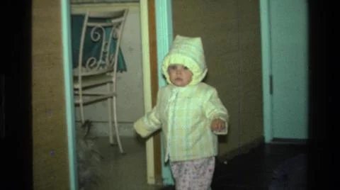 1977:CALIFORNIA USA. Newborn Baby First Walk Stock Photos