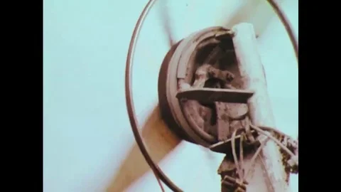 1978 - A scientist explains how a windmill and aluminum foil covered parabola Stock Footage 145400584